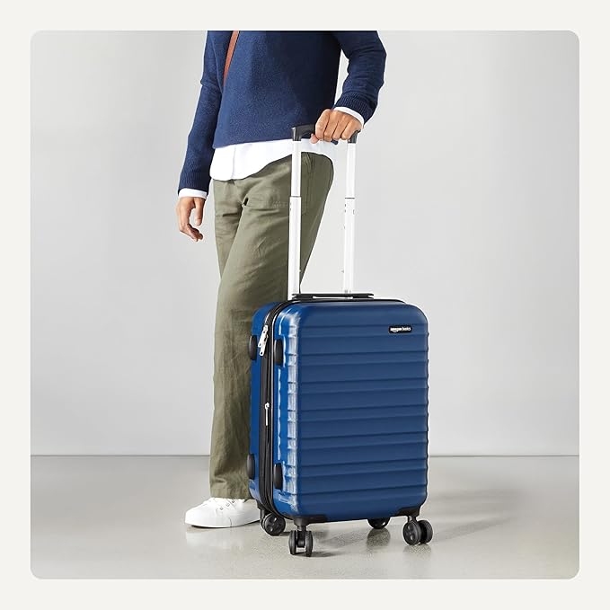 Amazon Basics 21" Hardside Carry-On Luggage, Hardshell Suitcase With Wheels, Expandable For Up to 25% More Space, With Scratch-Resistant Surface, Four Multi-directional Wheels, Navy Blue
