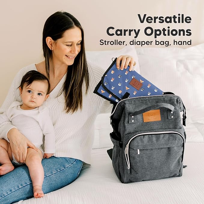 KeaBabies Portable Diaper Changing Pad - Large Waterproof Baby Changing Mat, Compact Travel Diaper Clutch, Functional Pockets Fit Newborn Essentials, Wipeable & Padded Baby Changer (Pets & Paws)